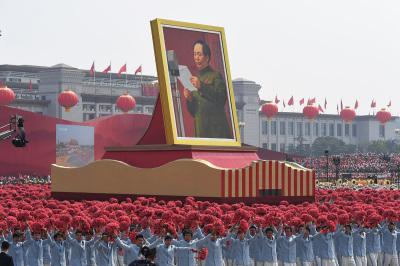 A giant portrait of former Chinese Communist Party leader Mao Zedong passes by Tiananmen Square during the National Day parade in Beijing on October 1, 2019, to mark the 70th anniversary of the founding of the People's Republic of China.