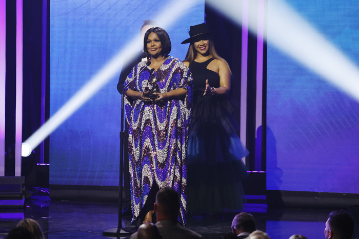 In this image released on Oct. 21, 2022, CeCe Winans and Erica Campbell speak onstage during the 53rd Annual GMA Dove Awards at Lipscomb Allen Arena on Oct. 18, 2022, in Nashville, Tennessee.