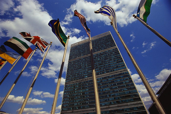 Flags fly outside the General Secretariat building at the United Nations Headquarters in New York City.