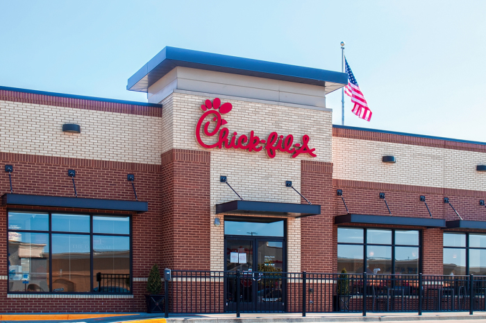 Chick-fil-A restaurant with an American flag in Tulsa, Oklahoma.