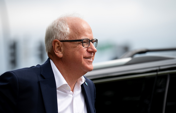 Minnesota Gov. Tim Walz arrives to speak at a press conference regarding new gun legislation at City Hall on August 1, 2024, in Bloomington, Minnesota.