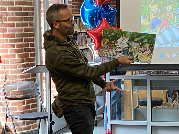 Actor Kirk Cameron reads aloud his children's book 'Pride Comes Before the Fall' during a See You at the Library event at James M. Duncan Library in Alexandria, Va., Aug. 24, 2024.