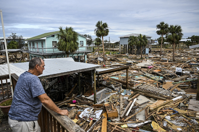 David Hester inspects damages of his house after Hurricane Helene made landfall in Horseshoe Beach, Florida, on Sept. 28, 2024. At least 44 people died across five U.S. states battered by powerful storm Helene, authorities said on Sept. 27, after torrential flooding prompted emergency responders to launch massive rescue operations.