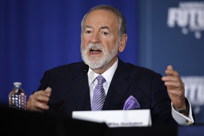 Former Arkansas Governor Mike Huckabee moderates a roundtable discussion with Republican presidential nominee, former U.S. President Donald Trump at the Drexelbrook Catering & Event Center on Oct. 29, 2024, in Drexel Hill, Pennsylvania.