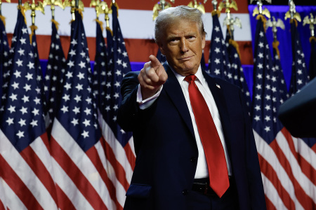 Republican presidential nominee, former U.S. President Donald Trump, arrives to speak during an election night event at the Palm Beach Convention Center on Nov. 06, 2024, in West Palm Beach, Florida. Americans cast their ballots today in the presidential race between Republican nominee former President Donald Trump and Vice President Kamala Harris, as well as multiple state elections that will determine the balance of power in Congress.