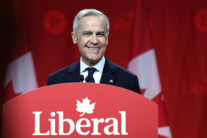 Canada's Liberal Leader and Prime Minister-elect Mark Carney speaks after being elected as the new Liberal Party leader in Ottawa on March 9, 2025. Canada's Liberal Party overwhelmingly elected Mark Carney as its new leader.